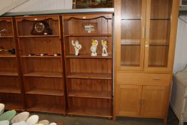 A pine open fronted bookcase with adjustable shelv