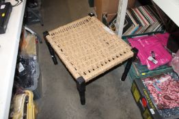 A string topped stool