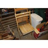 Two wooden folding chairs