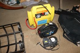 A jump starter; a battery charger; and a 12v air c
