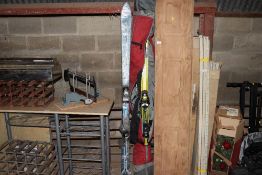 A pair of 1.8metre Fischer skis and a pair of 1.6m