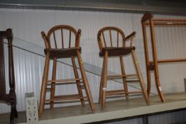 Two child's stick back high chairs