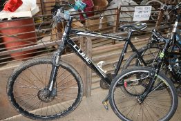 A Cube Odyssey Ltd mountain bike with front suspen