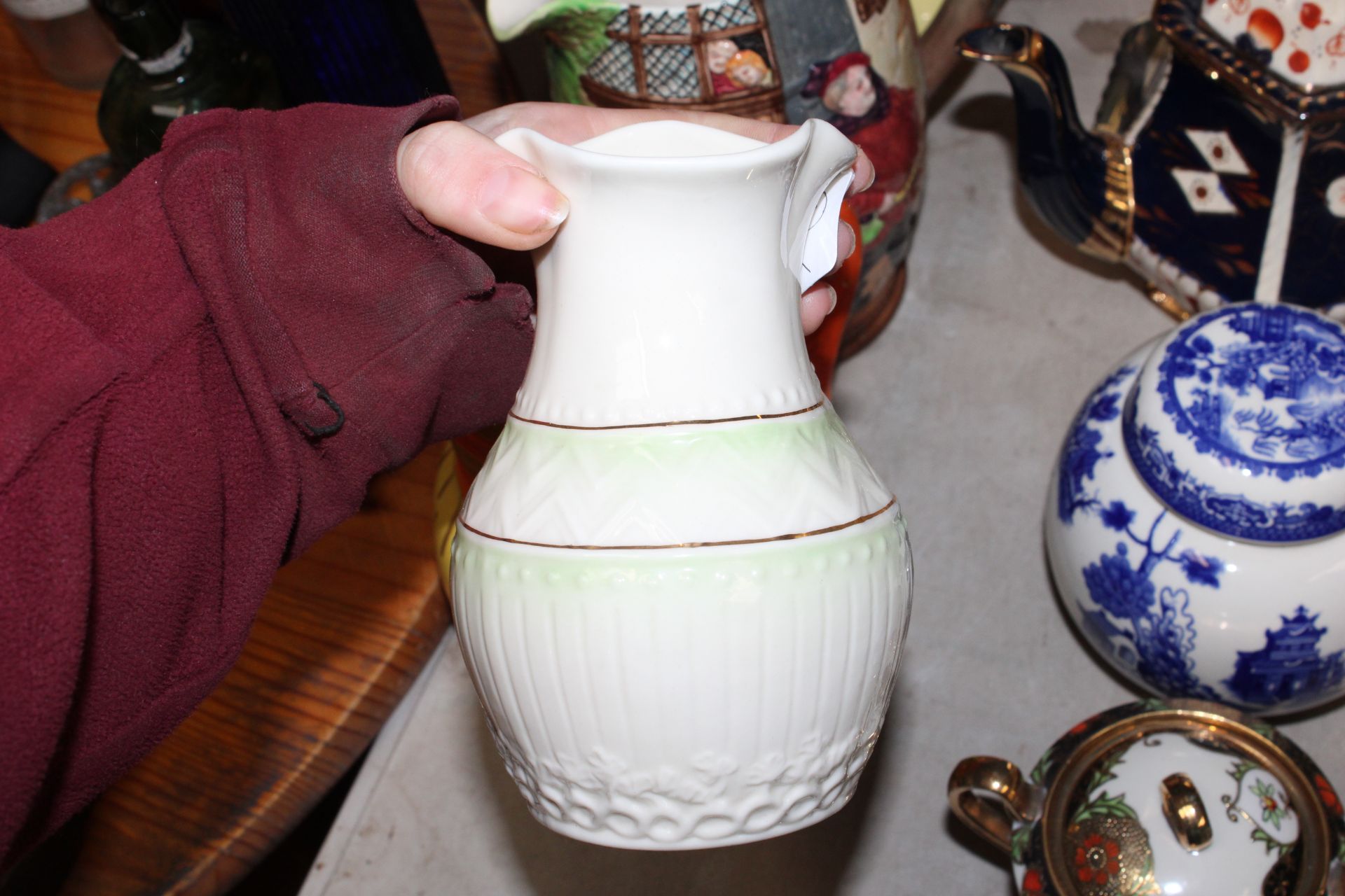 A quantity of various decorative items to include a Burleigh ware bird decorated jug; Beswick jug; a - Image 8 of 16