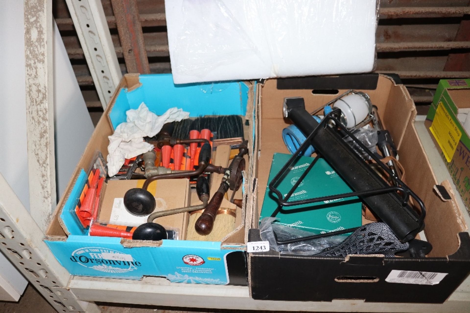 Two boxes containing various hand tools; bicycle seats; Camping Gaz lamp etc