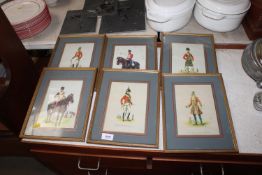 A quantity of framed and glazed military prints