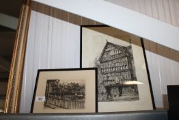 A framed and glazed black and white printing depic