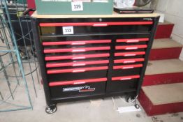 Unused 13-drawer mobile work bench. With wooden to