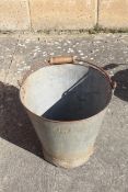 Pail with wooden handle. V