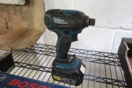 Makita impact driver and battery. V