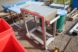 Stainless steel table on wheels. V