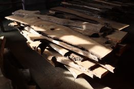 Pallet of mixed sawn live edge timber.
