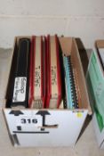 Box of manuals/ brochures.