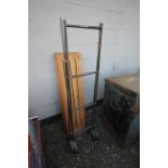 Iron side shelving unit.