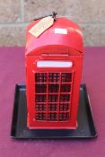 Telephone box bird feeder. V