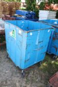 Blue steel waste bin on wheels. V