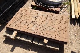 2x unused 60in x 28in manhole covers with frames.