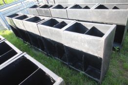 5x two space plastic pig feeder.