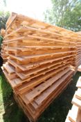 Stack of large shipping pallets.