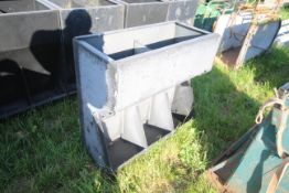 Three space plastic pig feeder.