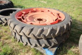 Pair of 8.3-44 row crop wheels and tyres. 8-stud bolt in centres.