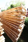 Stack of large shipping pallets.