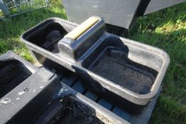Plastic water trough. V
