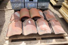 50x black glazed roof tiles and 2x ridge tiles.