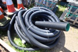 2x rolls of drainage pipe.