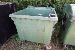 Commercial wheelie bin with contents of flue parts