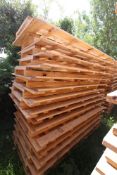 Stack of large shipping pallets.