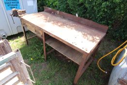 Metal welding bench with vice.