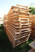 Stack of large shipping pallets.