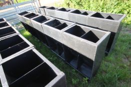 5x two space plastic pig feeder.