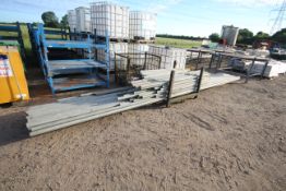 Large quantity of scaffolding. To include long poles, short poles and stillage of clamps. V