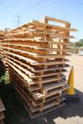 Stack of large shipping pallets.