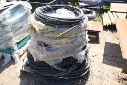 Large quantity of trickle irrigation pipe.