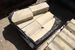 Pallet of stone replica window surrounds.