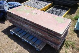 Pallet of steel covered oak doors. Ex-prison.