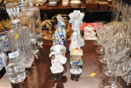 Two Staffordshire money boxes AF; a blanc de chine type figure and various other figures