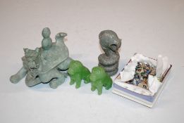 A pair of jade coloured Temple Dogs, a soapstone carving in the form of a serpent; a Grays Pottery