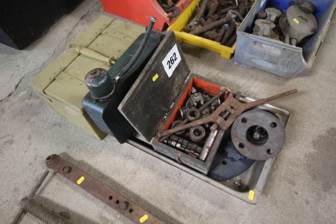 Various taps and dies, small diesel tank, Fordson water pump and radiator cap, wooden box etc.