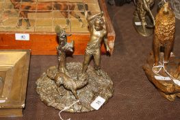 A continental bronzed figure group of huntsmen and wolf
