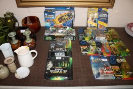 A collection of Star Wars actions figures to include Kenner Deluxe, Boba Fett and Hasbro Star Wars