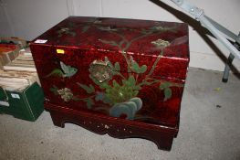 An Oriental decorated box on stand