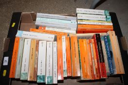 A box of various Penguin paperback books