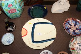 Caroline Fish, Studio Pottery dish and one other Studio Pottery blue glazed plate