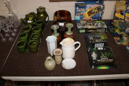 A collection of various pottery to include a pair of Royal Doulton leaf decorated vases, a Poole