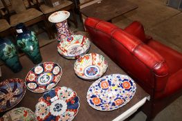 A Japanese Imari pattern porcelain vase and Imari pattern bowls and dish (some damage)