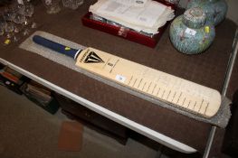 A hand signed cricket bat by the 2002/2003 Ashes Tour England cricket team